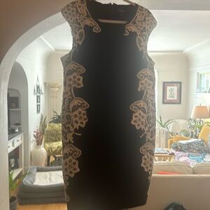 Torrid size 18-fits like a 16 due to the lace detail. Worn only once.